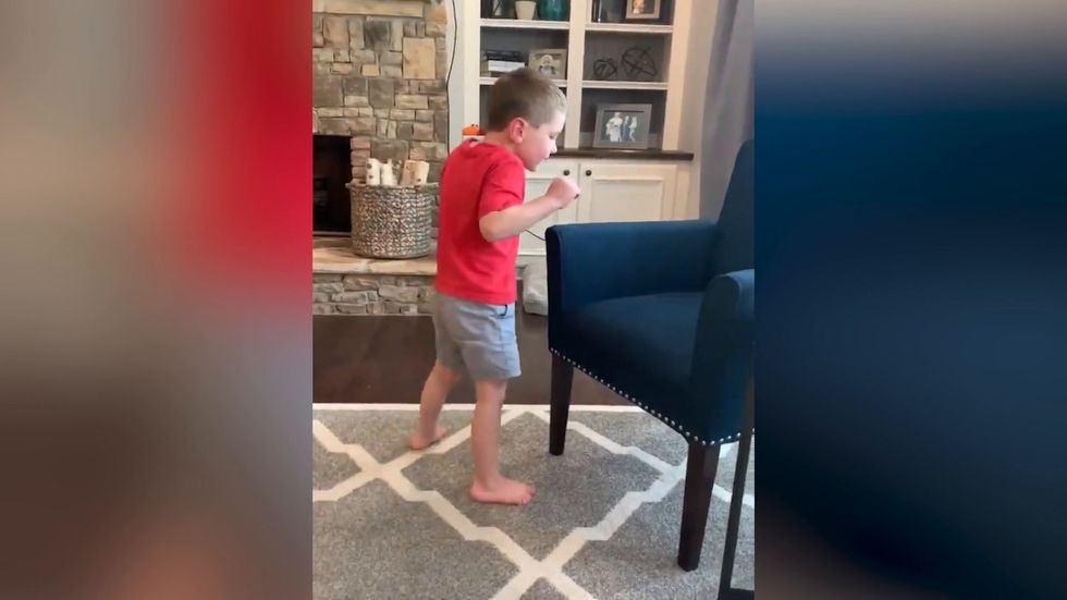 Five-year-old boy with brain condition takes first steps in viral video