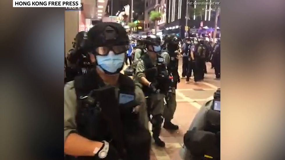 Hong Kong riot officer chants 'Black Lives Matter' on patrol