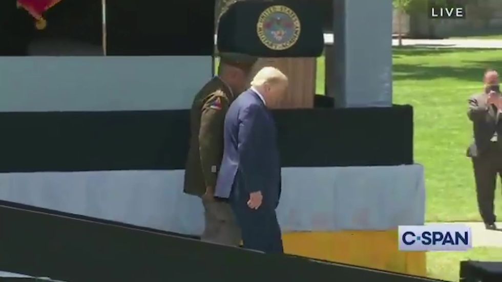Trump appears to have trouble walking down ramp at West Point ceremony