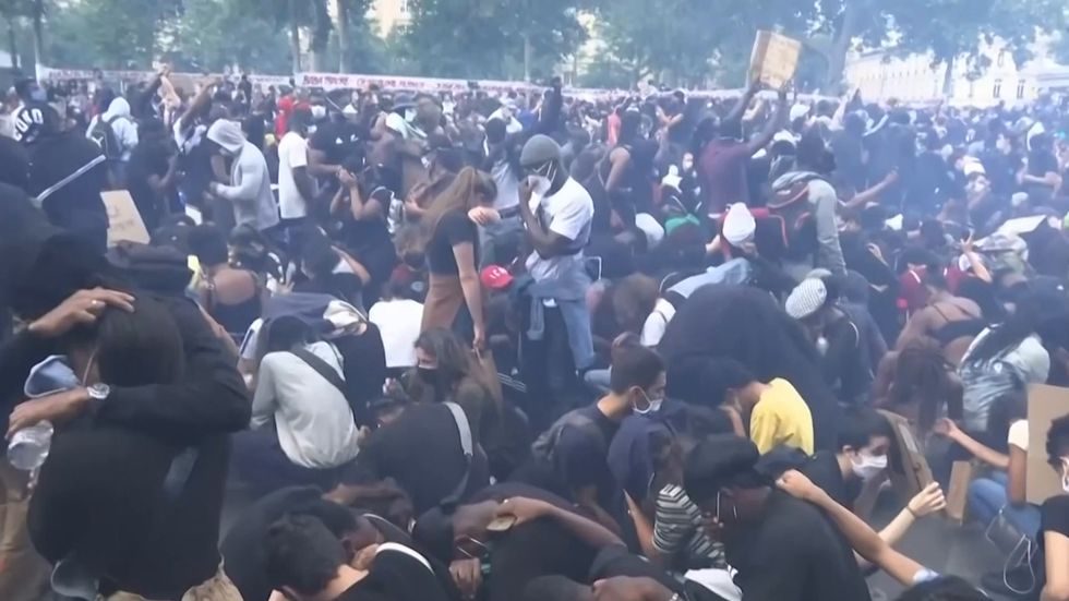 Tear gas fired at rally against police brutality and injustice in Paris