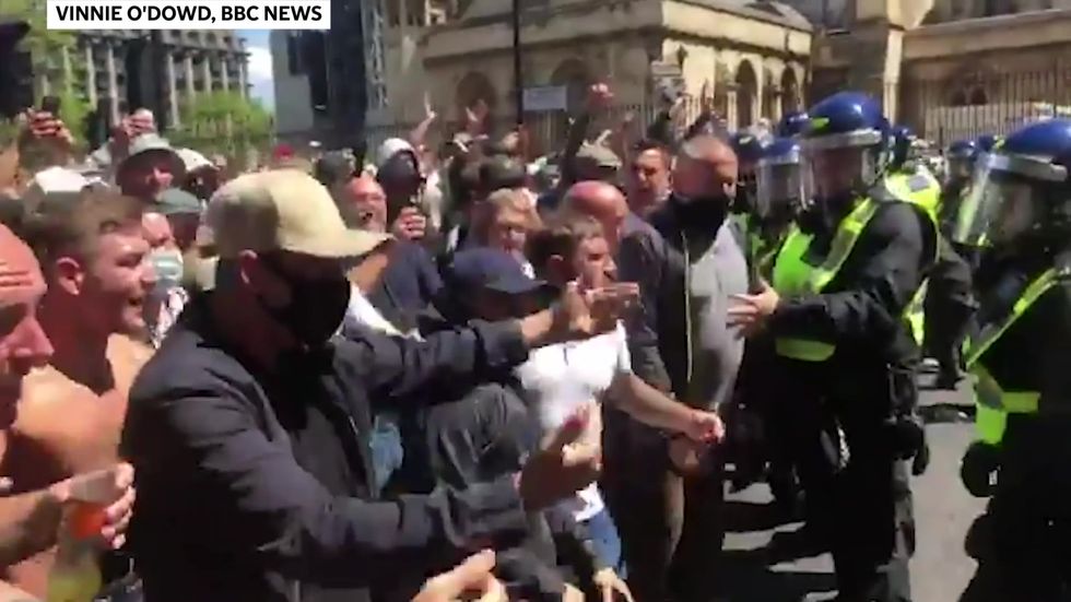Thugs attack riot police at BLM counter protest in London