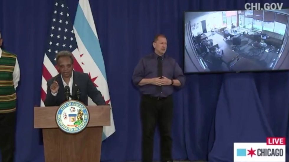 Chicago mayor responds to police 'lounging' at US congressman's office and making popcorn while nearby shops looted