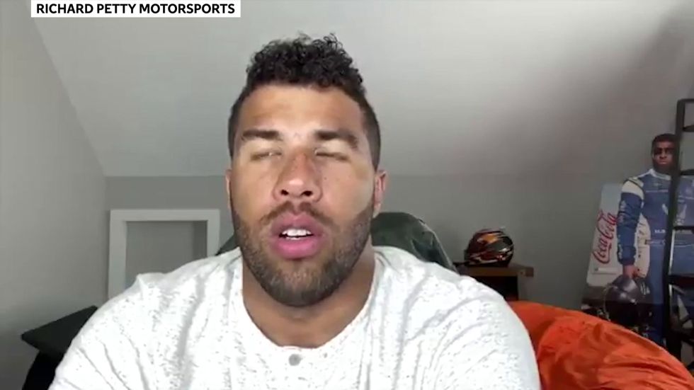 Bubba Wallace calls for Confederate flags to be banned from NASCAR racetracks as he reveals car with Black Lives Matter paint scheme