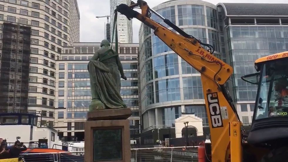 Robert Milligan: Workers remove statue of slave trader in London