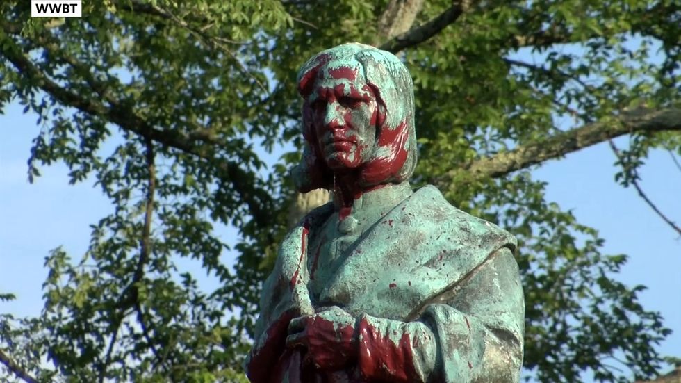 Richmond protesters throw Columbus statue in lake