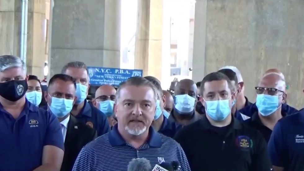 NY police union boss: 'Stop treating us like animals'