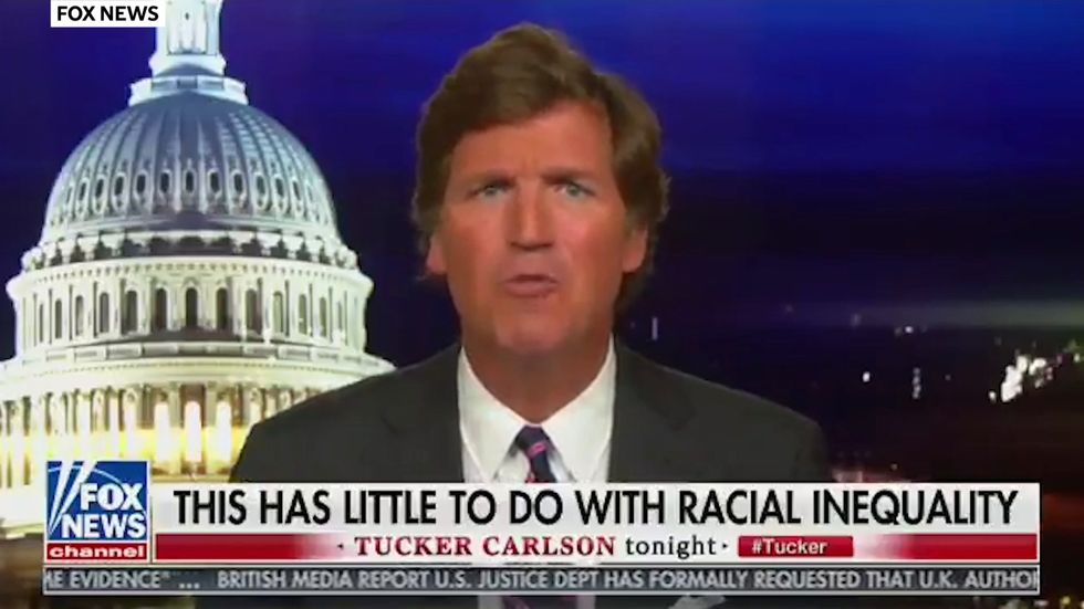 Tucker Carlson tells Fox viewers 'black people are coming for you'