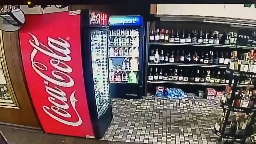 CCTV shows officer punch man who called 911 to report robbery