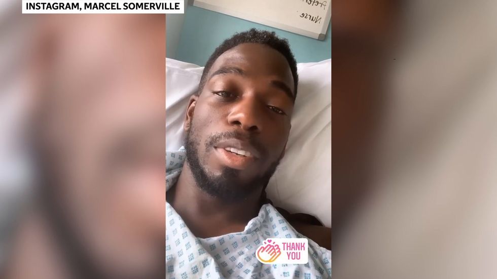 Love Island's Marcel Somerville says he 'nearly died' as he shares video from hospital bed