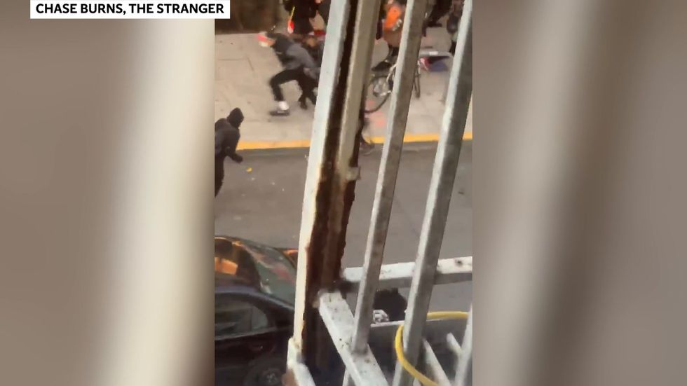 Armed man drives through barricade at Seattle protests