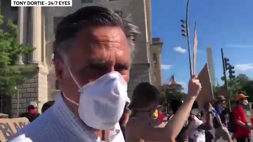 Mitt Romney marches for Black Lives Matter