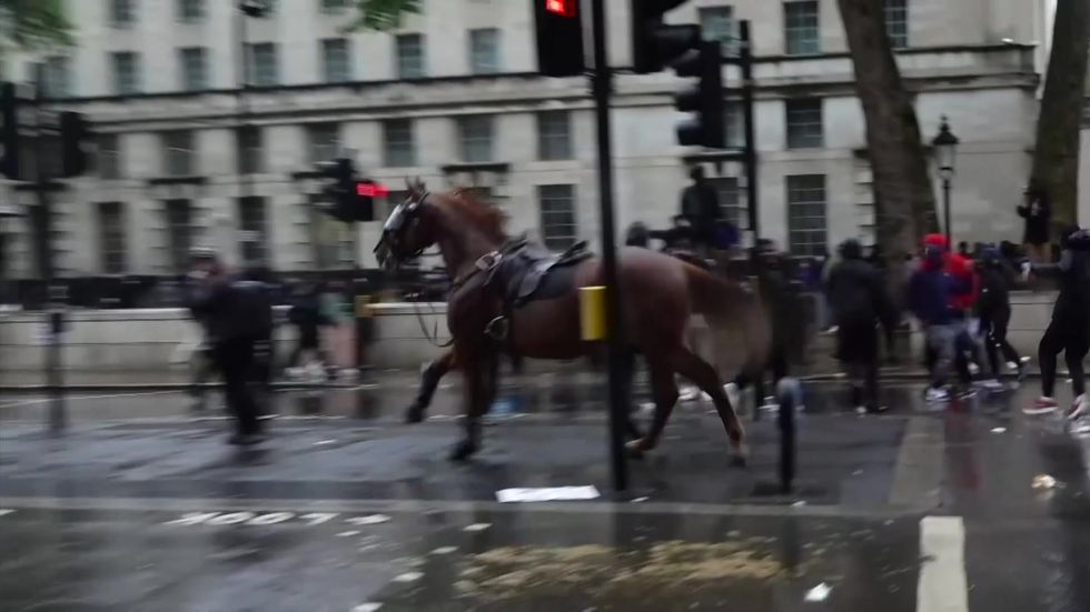 Mounted police charge BLM protesters in London