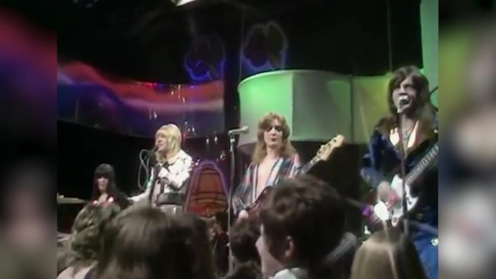 Bassist Steve Priest performs with The Sweet on Top of the Pops