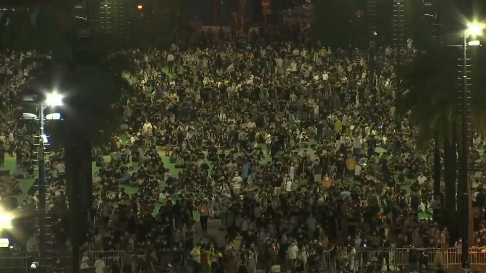 Thousands defy Hong Kong ban, attend Tiananmen 1989 vigil