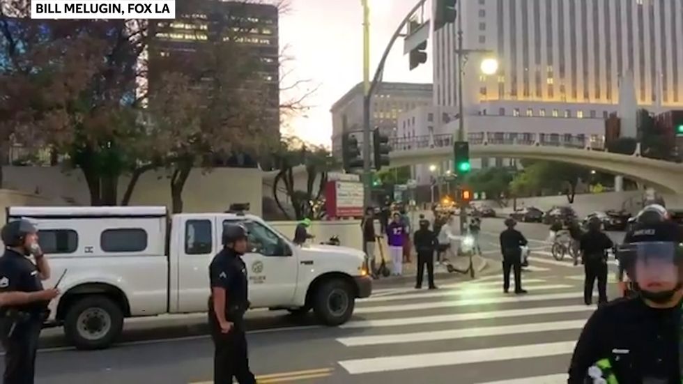 Los Angeles police ask protesters to disperse or face arrest