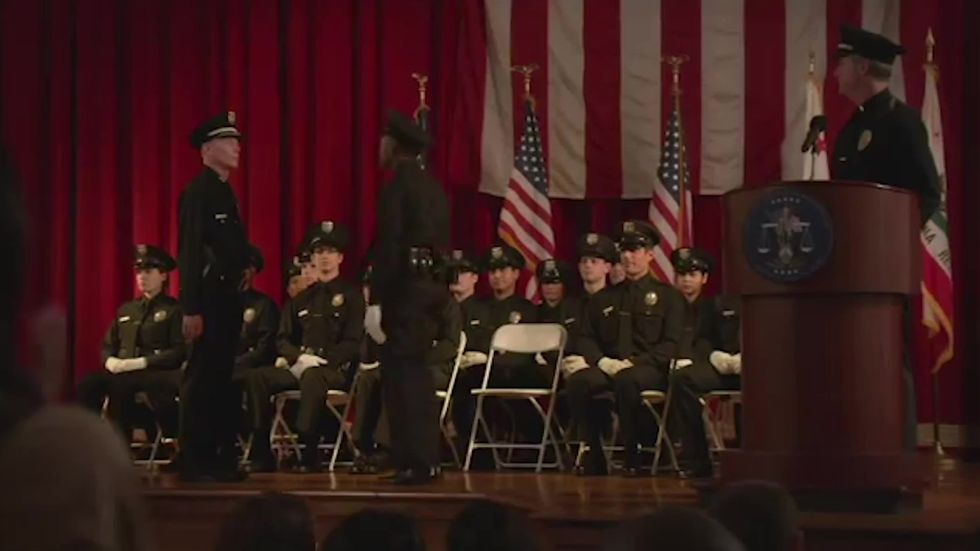 Winston graduates cop training in New Girl