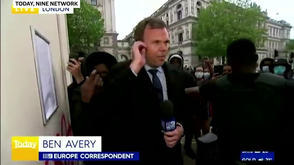 Australian TV crew attacked by protesters live on air in London