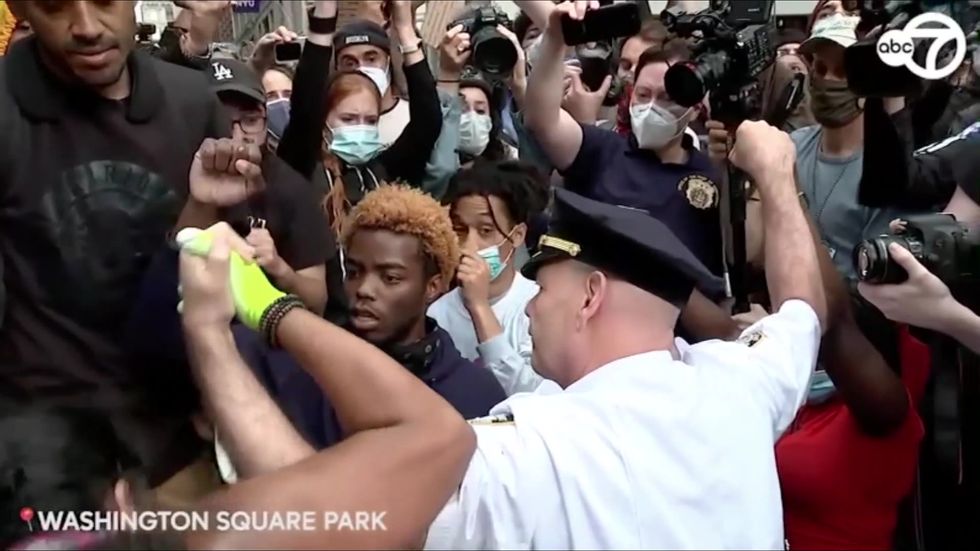 NYC's highest-ranking uniformed member takes a knee hugs George Floyd protesters