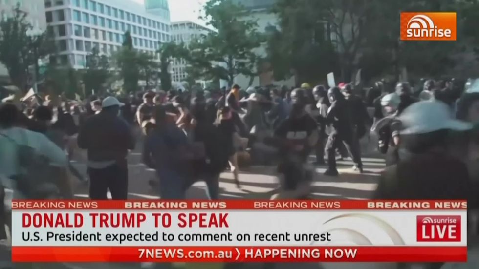Australian reporter and crew hit by US police live on air