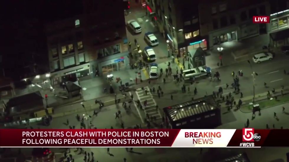 SUV runs into protesters in Boston