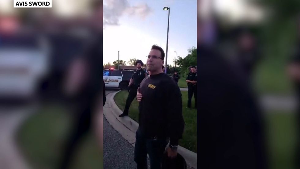 Michigan Sheriff joins march against George Floyd's death