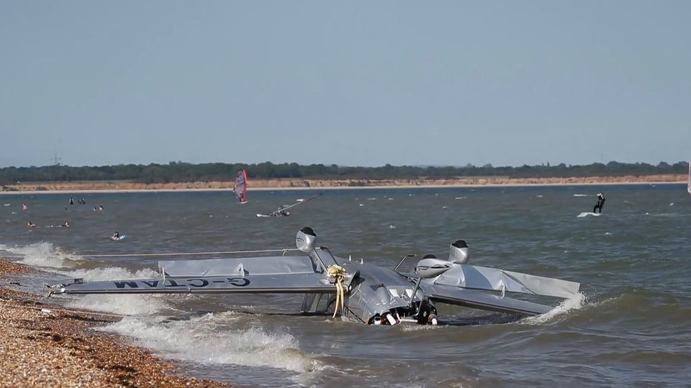 Wreckage of light aircraft washes up on beach after crashing into sea near Calshot Spit