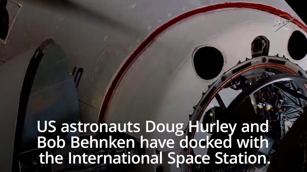 NASA and SpaceX craft docks with International Space Station