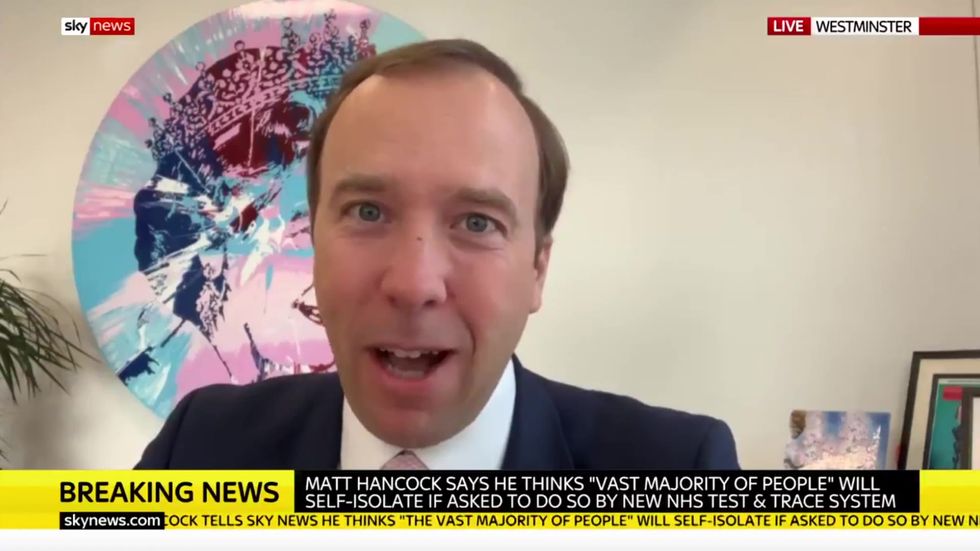 Matt Hancock laughs hysterically after being asked about the 'rushed' test and trace launch