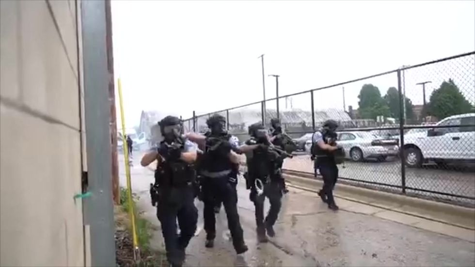 Local news reporter films war-like scenes at George Floyd protest in Minneapolis