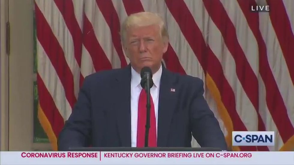 Trump mocks reporter for wearing face mask