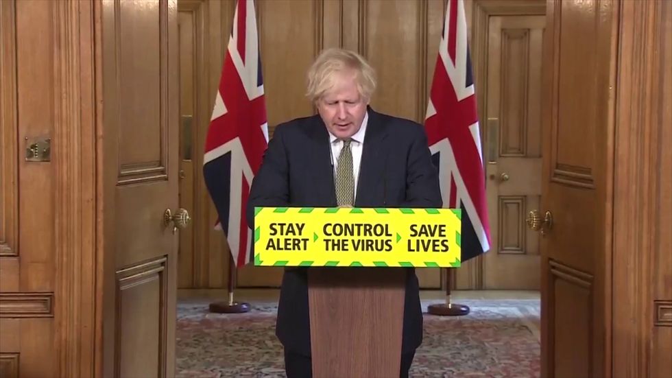 Boris Johnson leaps to the defence of Dominic Cummings