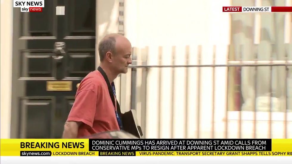 Dominic Cummings arrives in Downing Street as Tory MPs call for resignation