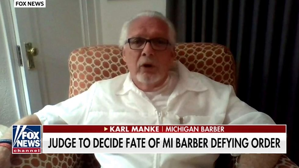 Michigan barber protests state business shutdown