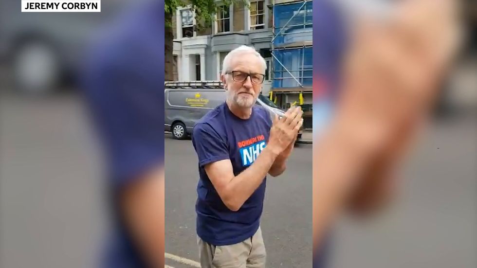 Jeremy Corbyn claps for carers in NHS t-shirt