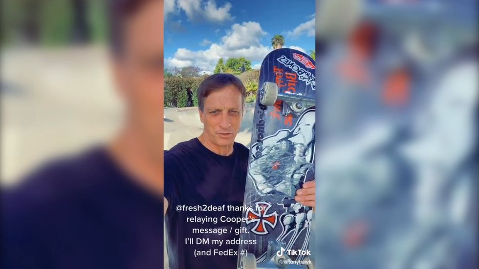 Tony Hawk exchanges skateboards with six-year-old fan