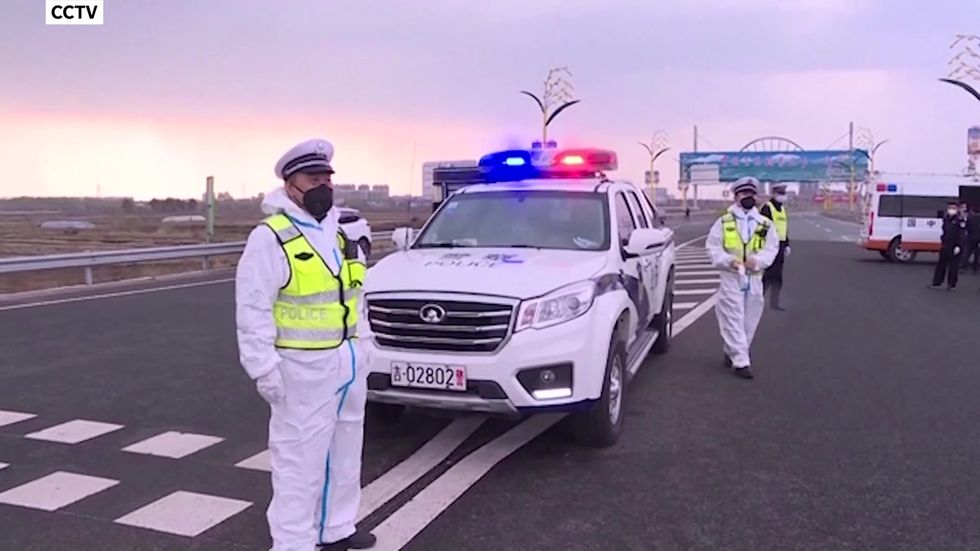 Police patrol streets in China's Jilin Province after as fresh outbreak continues to spread