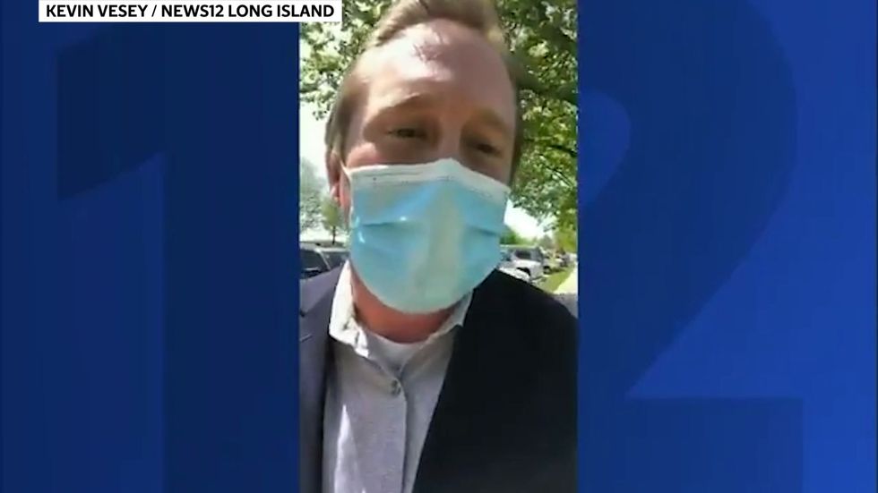 Protesters shouting 'fake news' harass reporter who wanted to tell their story