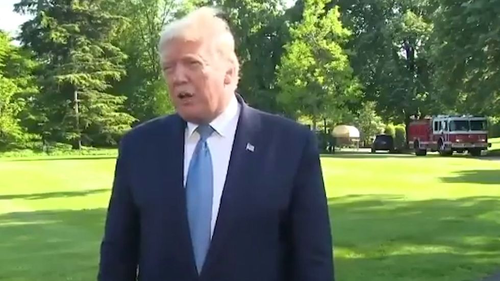 Trump 'looking at' making coronavirus vaccine free