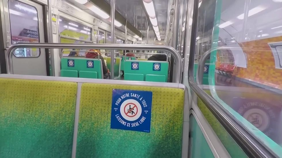 Paris metro commuters return but keep distance