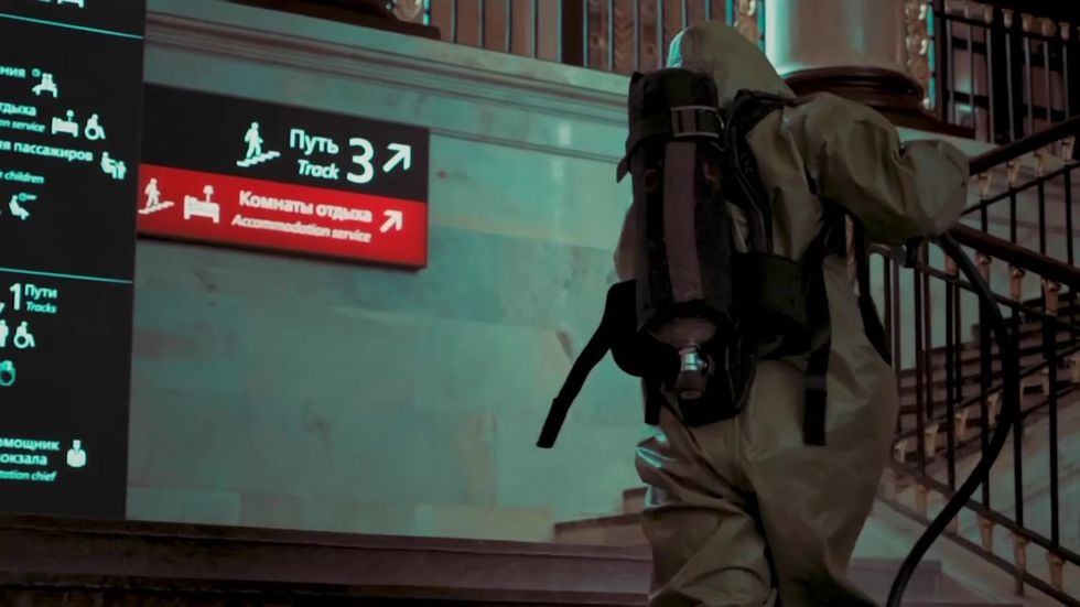 Team disinfects train station in Russia