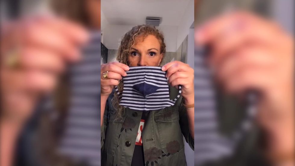 TikTok user shows how to make a face mask using a sock.mp4