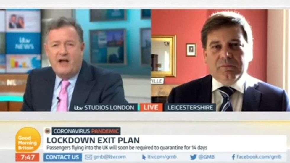 Piers Morgan attacks Tory MP who gives confused advice over rules on visiting family