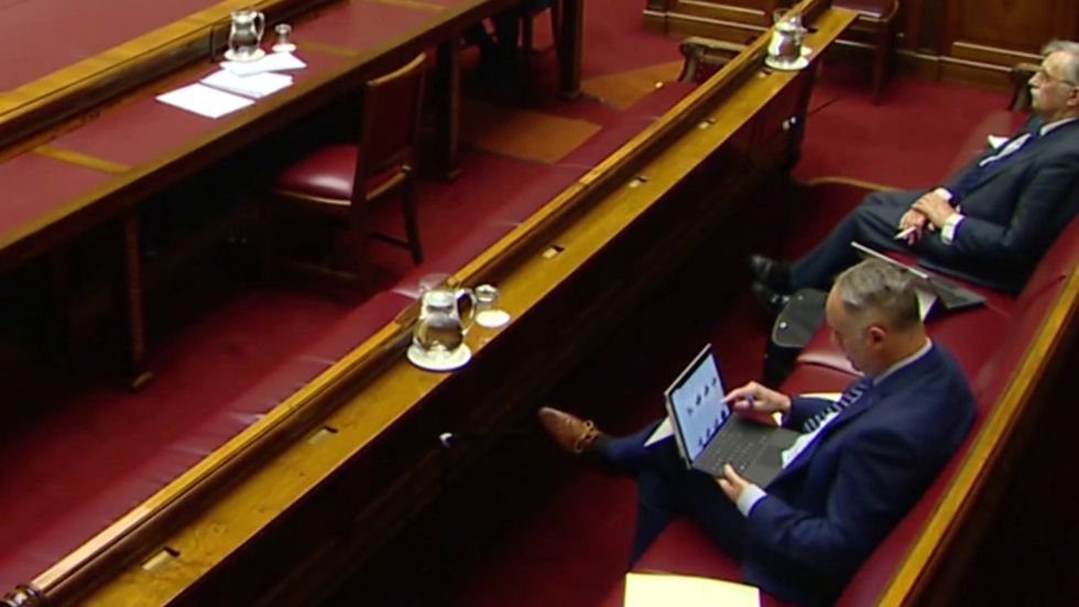 DUP MLA Alex Easton caught shoe shopping during Stormont crisis meeting