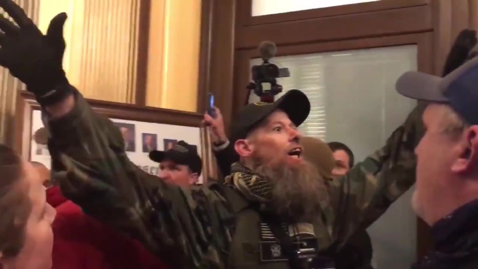 Armed protesters storm Michigan Capitol to protest stay-at-home orders