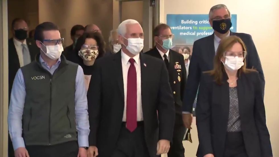 Pence wears mask on visit to Indiana factory following outrage over his failure to do so at Mayo Clinic