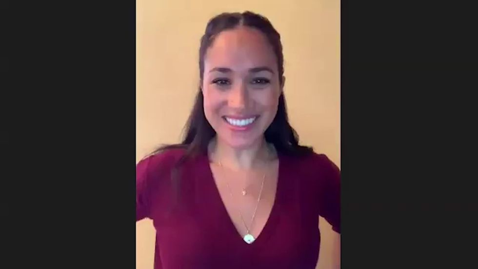 Meghan Markle talks to Smart Works client before job interview