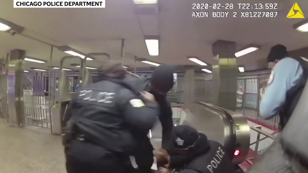 Chicago police officer shoots subway rider in back