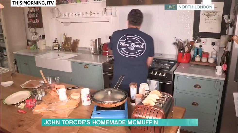 TV chef doesn't realise there's a fire while he's cooking on live TV