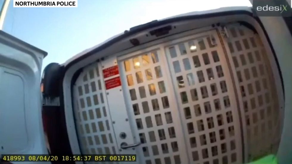 Woman caught on body-cam deliberately coughing in police officers face