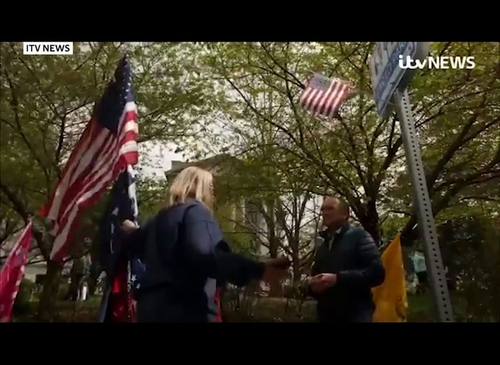 Protestor says she doesn't believe in coronavirus science because she believes in God instead